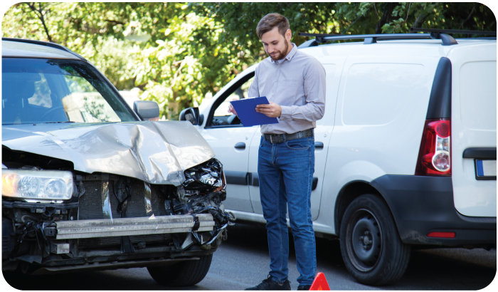 An Adjustor at the scene of an accident